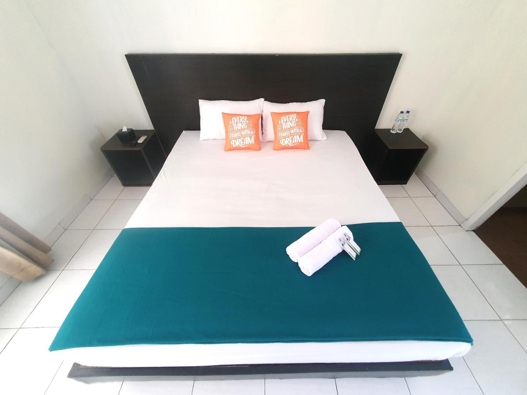Ruang Tidur At Dpalma Bogor Hotel Buitenkant foto